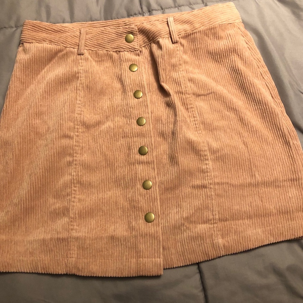 Pink suede button skirt